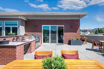 Rooftop bbq area with seating